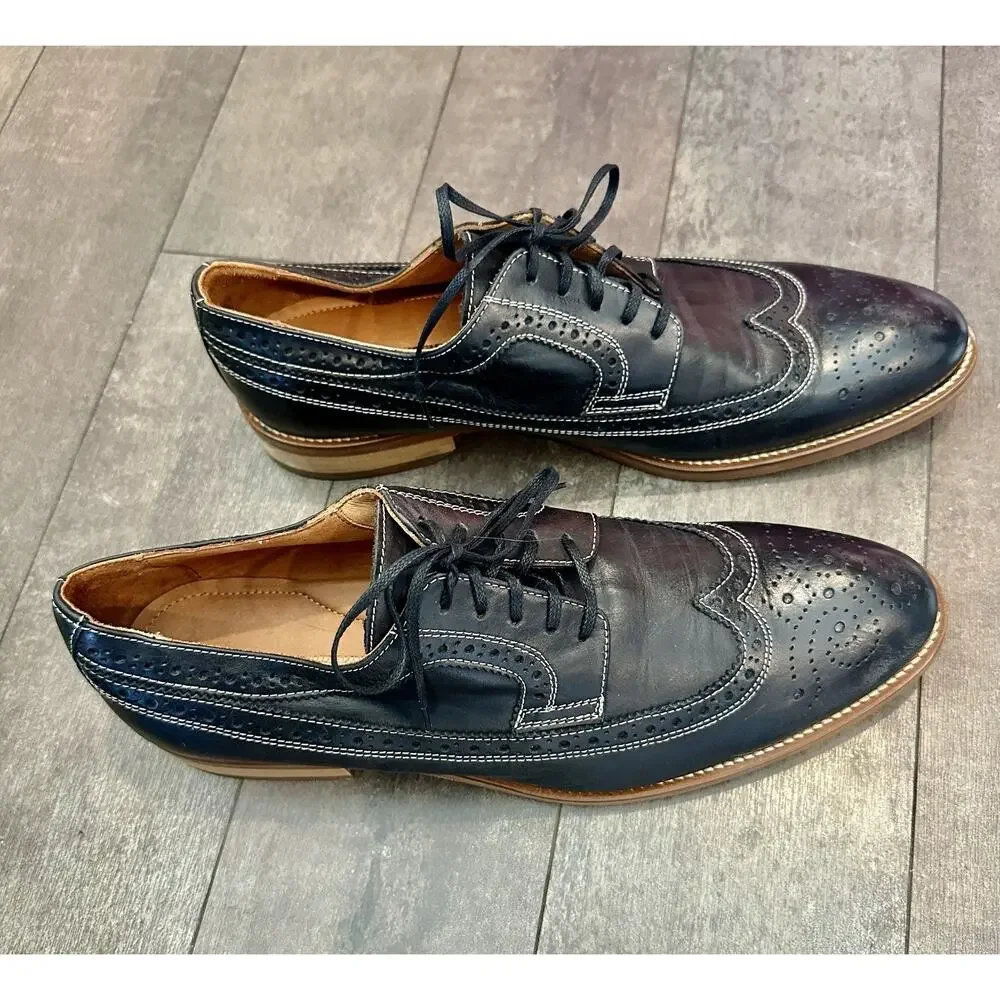 Johnston & Murphy Mens Conrad Wingtip Black Leather Oxford Shoes.